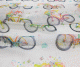 Fehér organza maradék ezüst mintával virág 120x330cm széles/Cikksz:1241211